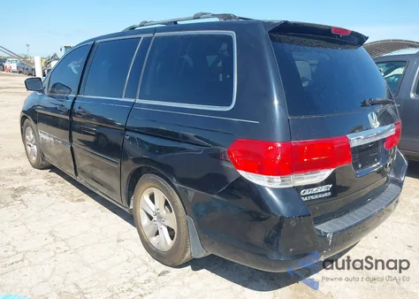 2009 Honda Odyssey Touring from USA, damaged, VIN 5FNRL389X9B037638